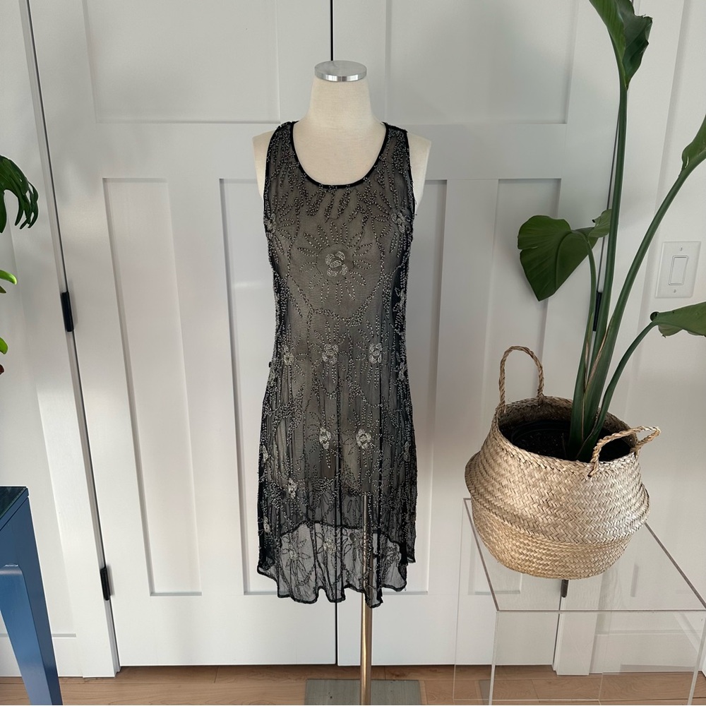 Vintage Sheer Beaded Black Women’s Dress. Sheer is all the rage.